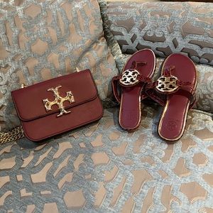 New burgundy Tory Burch handbag, have matching sandals in size 8 sold separate